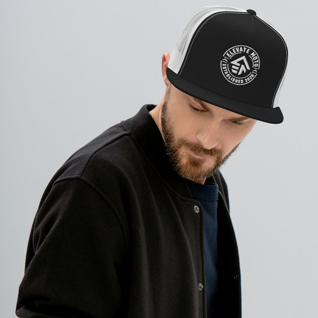Elevate Moto Trucker Cap in black and white, front view