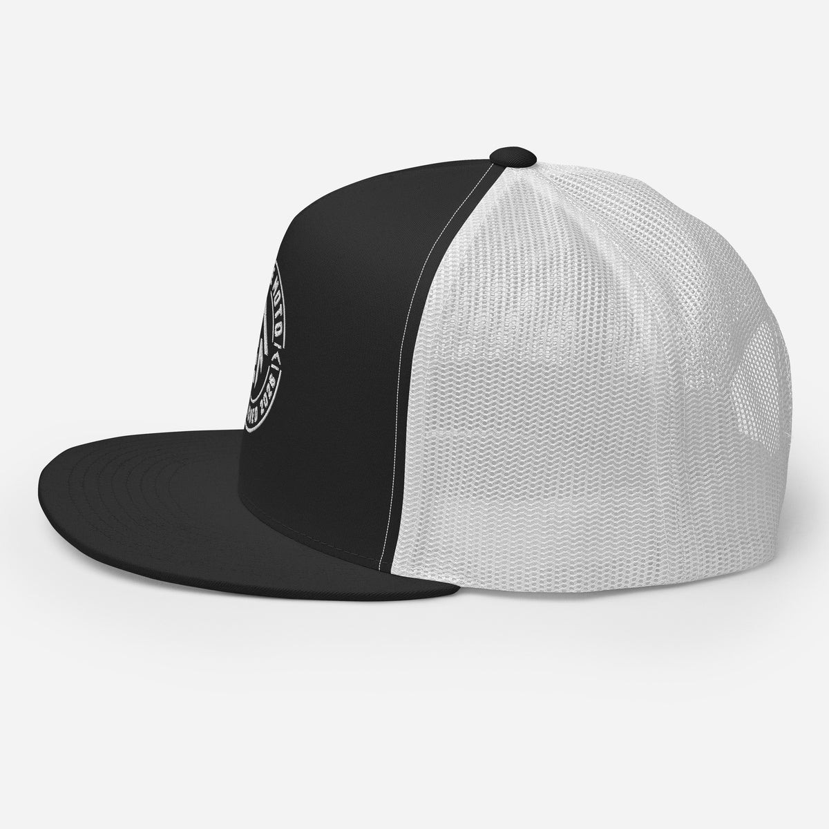 Elevate Moto Trucker Cap in black and white, left view