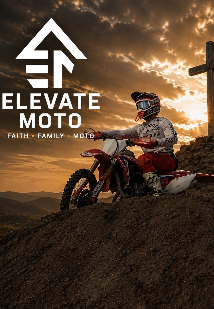 Elevate Moto — Faith, Family, Moto. Motocross rider on a dirt bike beside a wooden cross at sunset.